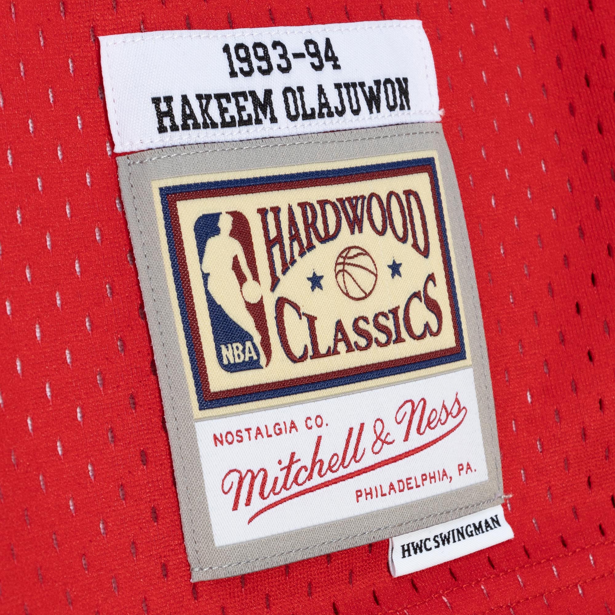 Hakeem Olajuwon Houston Rockets Mitchell & Ness Hardwood Classics 1993\/94 Split Swingman Jersey - Navy\/Red