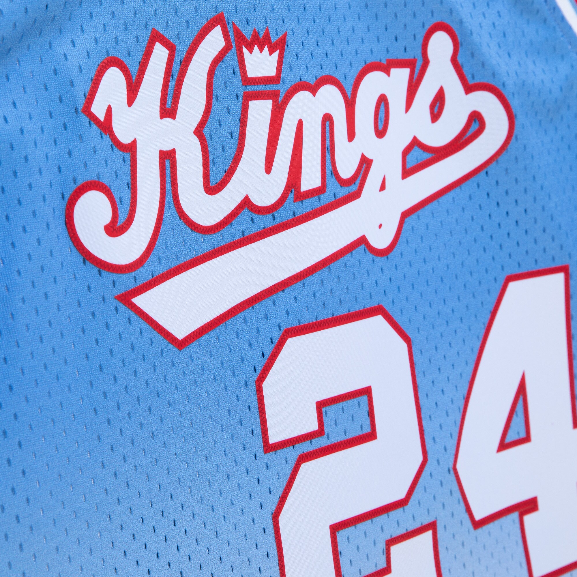 Reggie Theus Sacramento Kings Mitchell & Ness 1985\/86 Hardwood Classics Fadeaway Swingman Player Jersey - White\/Light Blue