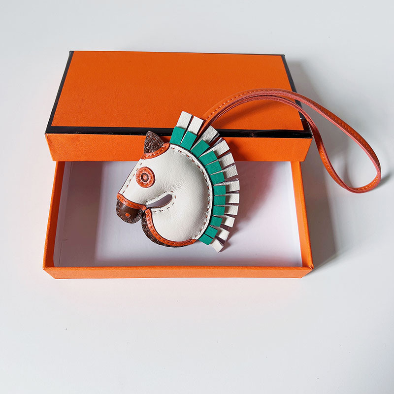 Handsewn unicorn pendant - MOVEMENTARTISAN