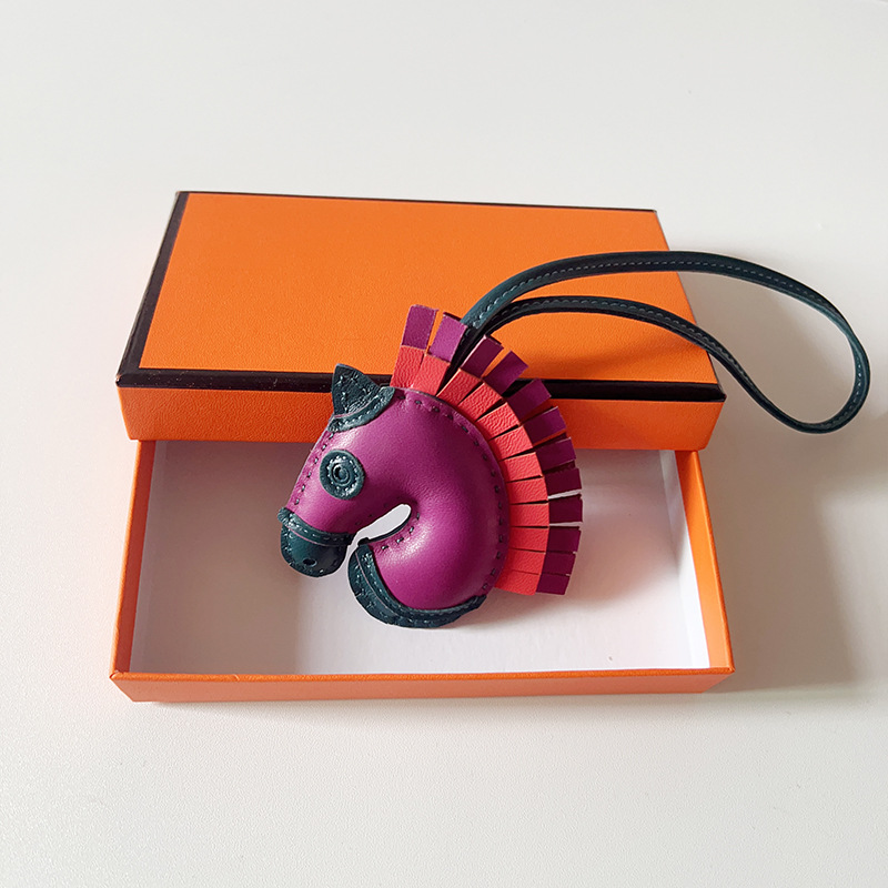 Handsewn unicorn pendant - MOVEMENTARTISAN