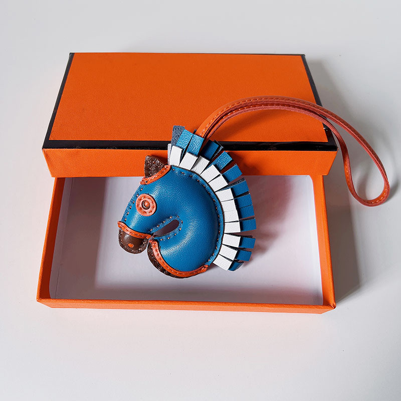 Handsewn unicorn pendant - MOVEMENTARTISAN