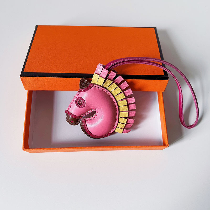 Handsewn unicorn pendant - MOVEMENTARTISAN