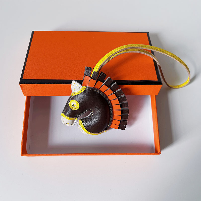 Handsewn unicorn pendant - MOVEMENTARTISAN