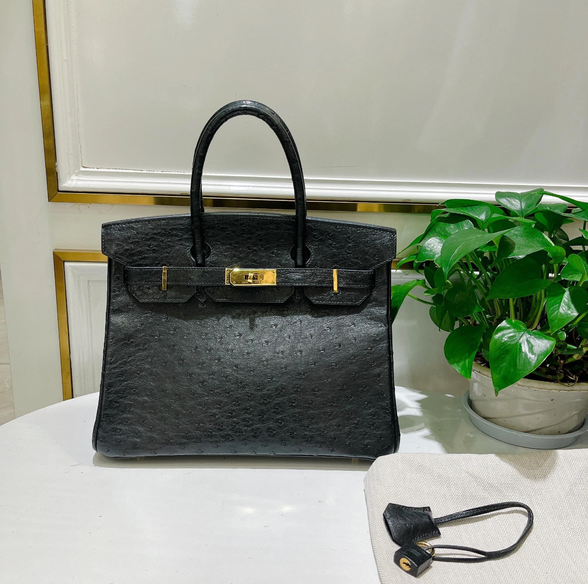 Birkin 25-35 Black Ostrich Leather with Gold Buckle - MOVEMENTARTISAN