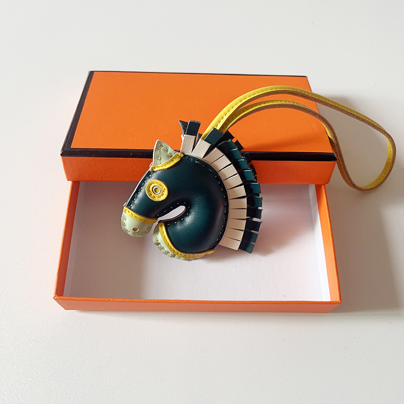 Handsewn unicorn pendant - MOVEMENTARTISAN