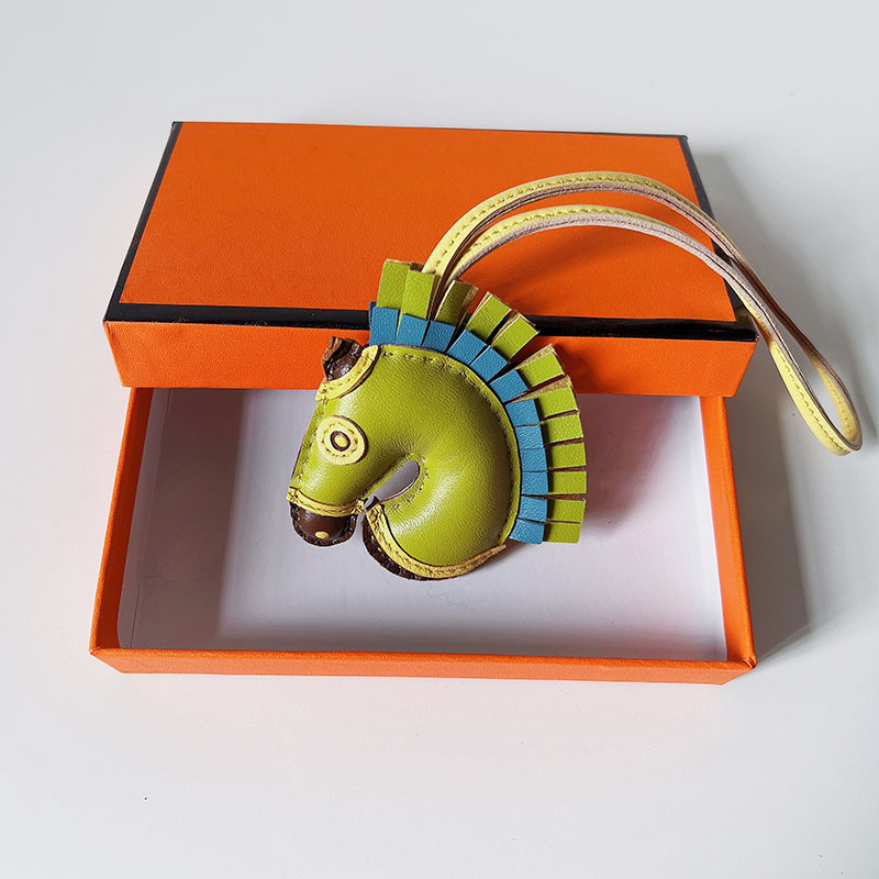 Handsewn unicorn pendant - MOVEMENTARTISAN