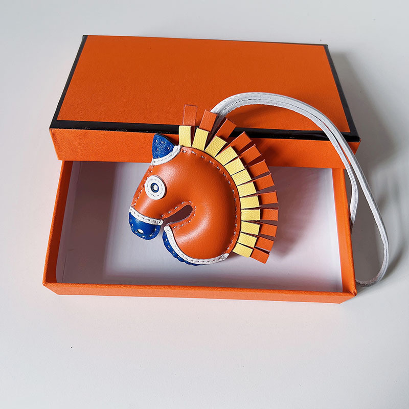 Handsewn unicorn pendant - MOVEMENTARTISAN