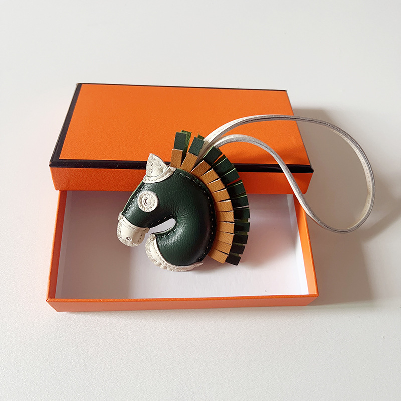 Handsewn unicorn pendant - MOVEMENTARTISAN